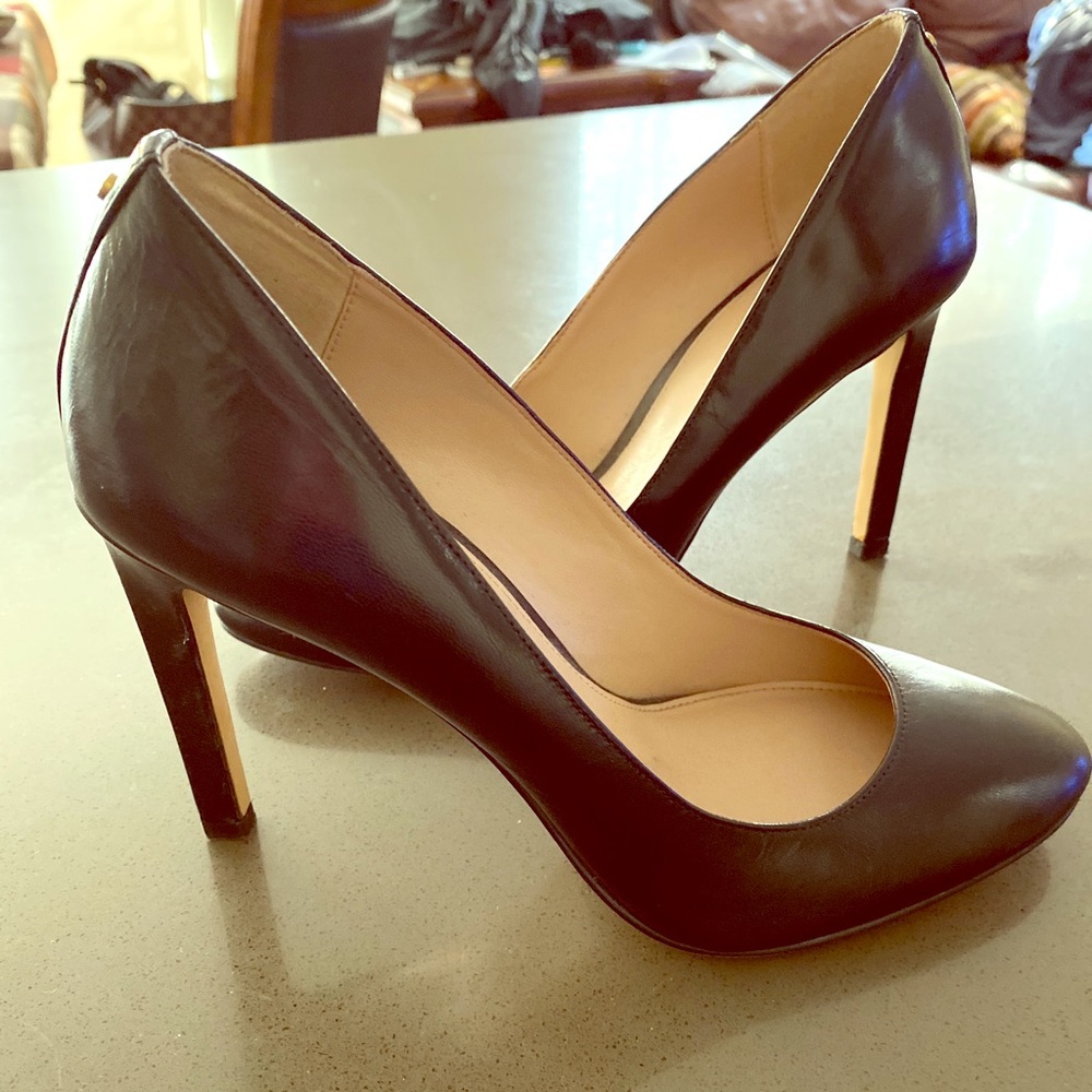 BCBG black pumps.